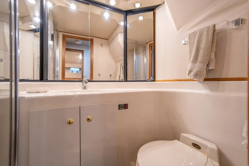 Slide: The Image of Luxurious bathroom in 2000 Bayliner 4788 Pilot House Motoryacht with modern fixtures. - 28