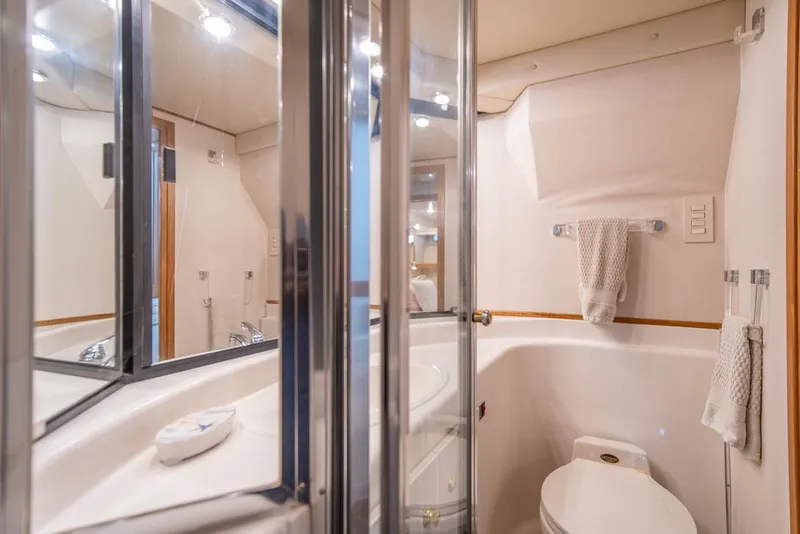 Slide: The Image of Luxurious bathroom in 2000 Bayliner 4788 Pilot House Motoryacht with modern fixtures. - 29