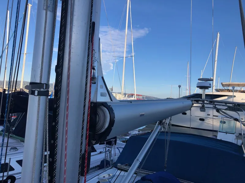 Slide: The Image of 1996 Catalina 42 MkII sailboat mast and rigging at marina. - 17