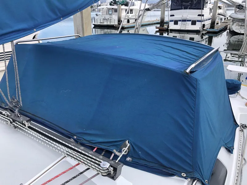 Slide: The Image of Blue canvas cover on 1996 Catalina 42 MkII sailboat at marina. - 22