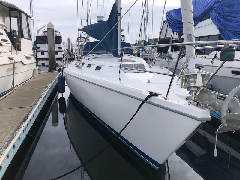 Slide: The Image of 1996 Catalina 42 MkII sailboat docked in marina, side view. - 31