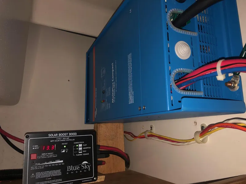 Slide: The Image of Blue Sky solar boost controller and inverter setup on a 1996 Catalina 42 MkII sailboat. - 40