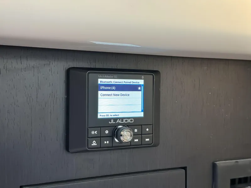 Slide: The Image of JL Audio system on 2025 Boston Whaler 380 Realm, displaying Bluetooth connection options. - 20