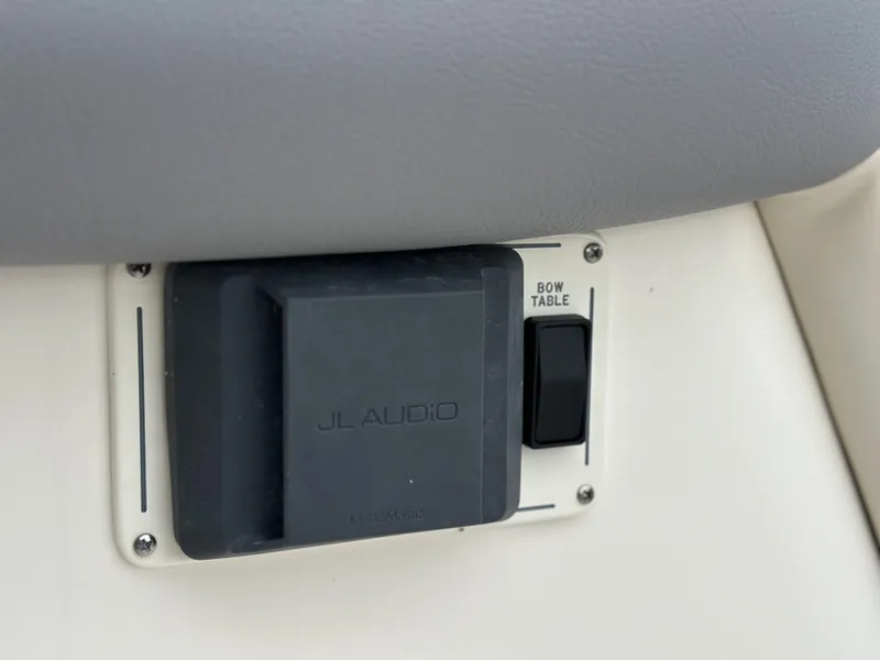 Slide: The Image of Control panel on 2025 Boston Whaler 380 Realm with JL Audio and bow table switch. - 38