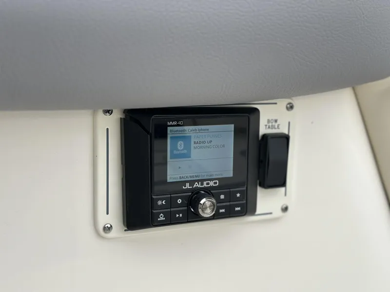 Slide: The Image of JL Audio system on 2025 Boston Whaler 380 Realm boat dashboard. - 39