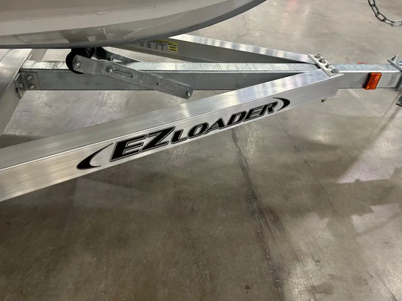 Slide: The Image of EZ Loader trailer for 2025 Highfield Velox 420 boat on concrete floor. - 5