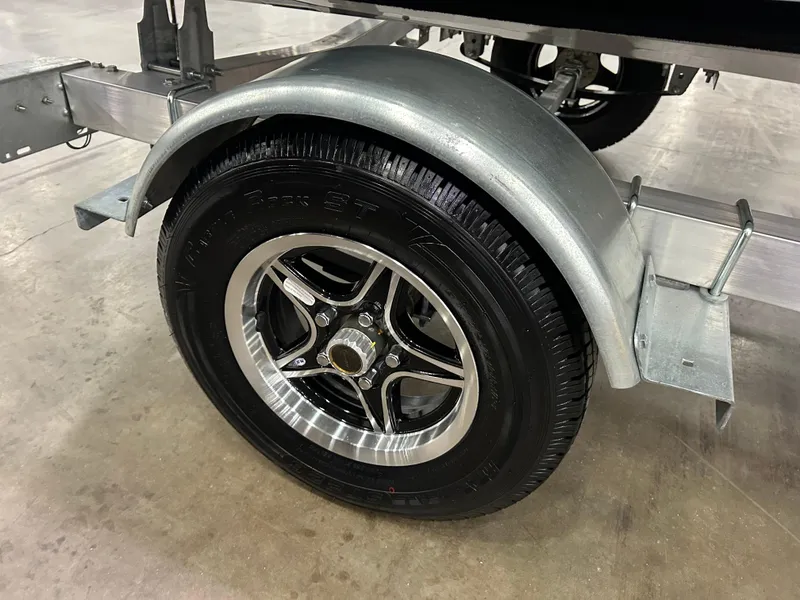 Slide: The Image of Trailer wheel and fender of 2025 Highfield Velox 420 on concrete floor. - 6