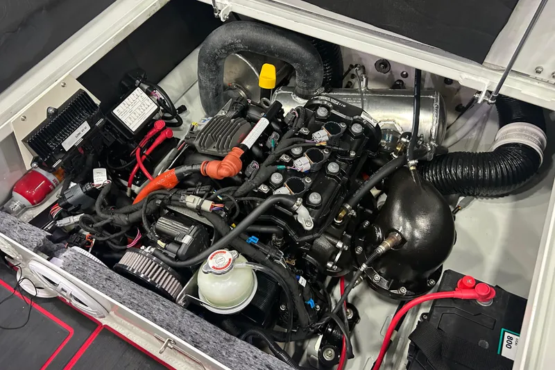 Slide: The Image of Engine compartment of 2025 Highfield Velox 420, showcasing detailed mechanical components and wiring. - 9