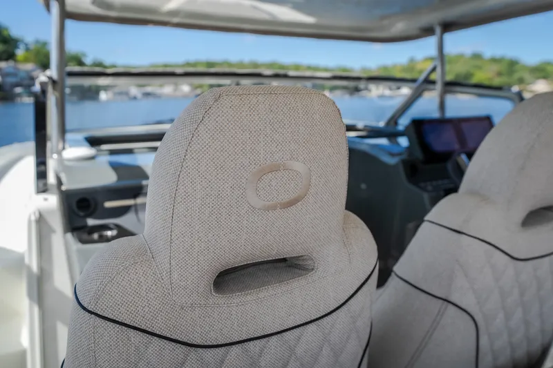 Slide: The Image of Luxurious interior of 2025 Catamaran YOT 36, featuring plush seating and modern dashboard. - 55