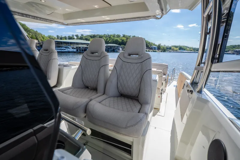 Slide: The Image of Luxurious interior of 2025 Catamaran YOT 36 with plush seating and scenic water view. - 67