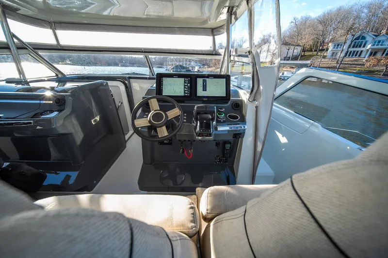 Slide: The Image of Interior view of 2025 Catamaran YOT 36 cockpit with modern navigation equipment. - 25