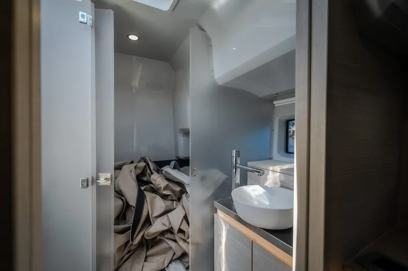 Slide: The Image of Modern bathroom interior of 2025 Catamaran YOT 36 with sink and storage space. - 47