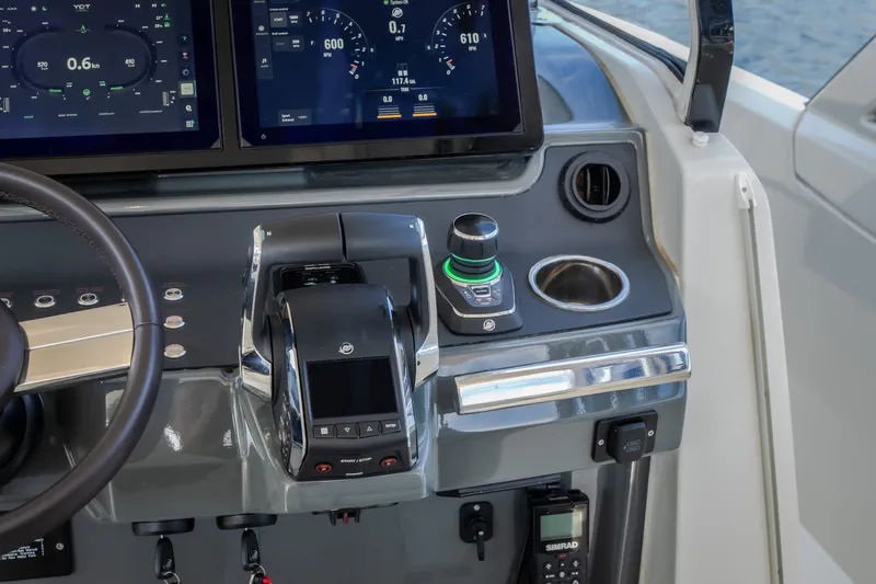 Slide: The Image of Control panel of 2025 Catamaran YOT 36 with advanced navigation displays and controls. - 33