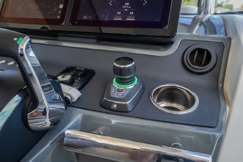 Slide: The Image of Control panel of 2025 Catamaran YOT 36 with joystick and digital displays. - 72