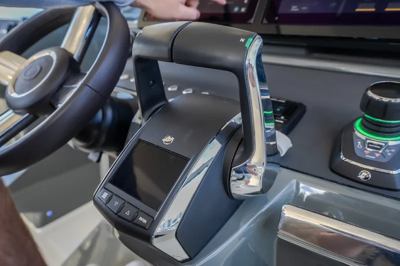 Slide: The Image of Control panel of 2025 Catamaran YOT 36, featuring advanced steering and navigation systems. - 50