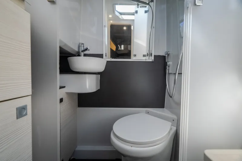 Slide: The Image of Modern bathroom in 2025 Catamaran YOT 36 with sleek fixtures and compact design. - 42