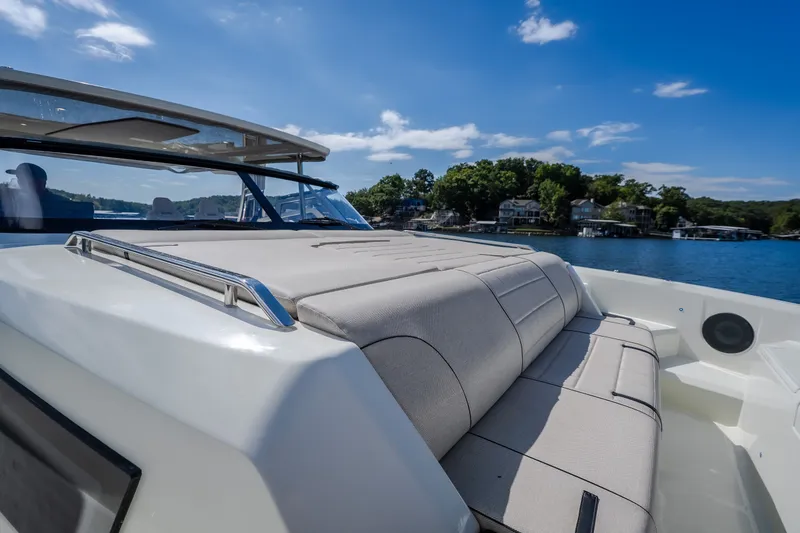 Slide: The Image of Modern Catamaran YOT 36 (2025) with sleek design on a sunny lake. - 61