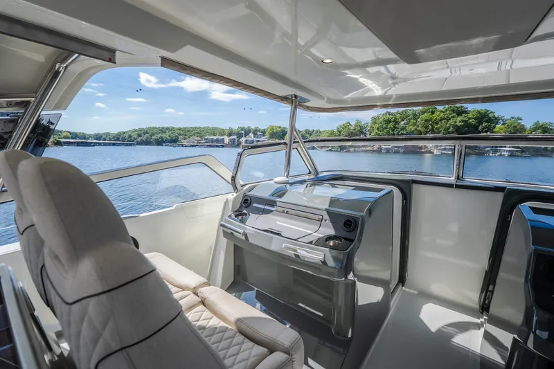 Slide: The Image of Luxurious interior of 2025 Catamaran YOT 36 with scenic water view. - 53