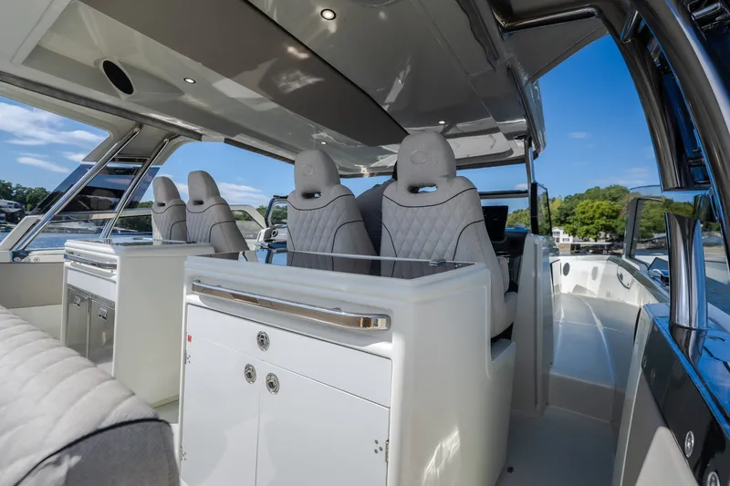 Slide: The Image of Luxurious interior of 2025 Catamaran YOT 36, featuring sleek seating and modern design. - 15