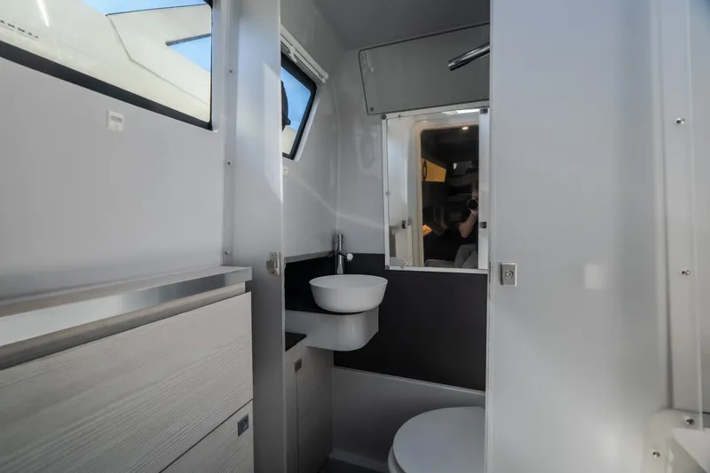 Slide: The Image of Modern bathroom interior of 2025 Catamaran YOT 36, featuring sleek design and compact fixtures. - 41