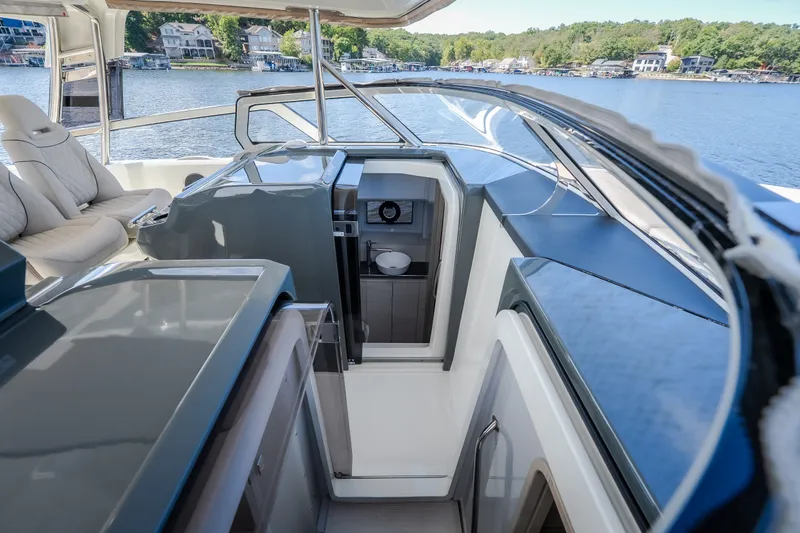 Slide: The Image of Luxurious 2025 Catamaran YOT 36 interior with sleek design and waterfront view. - 63