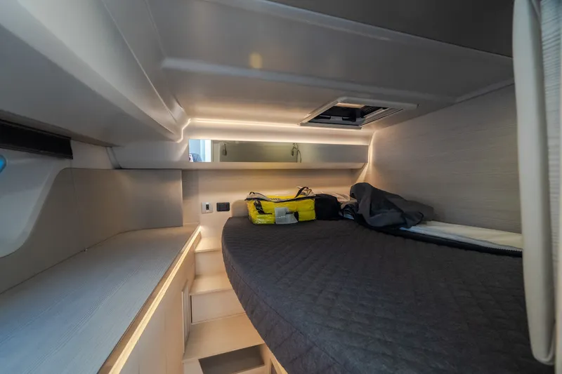 Slide: The Image of Interior cabin of 2025 Catamaran YOT 36 with cozy bed and modern lighting. - 46