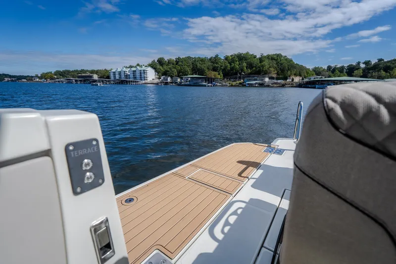 Slide: The Image of Modern Catamaran YOT 36, 2025 model, with scenic waterfront view and luxurious deck. - 29