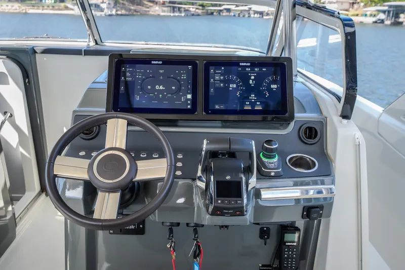 Slide: The Image of Modern helm of 2025 Catamaran YOT 36 with advanced navigation displays. - 32