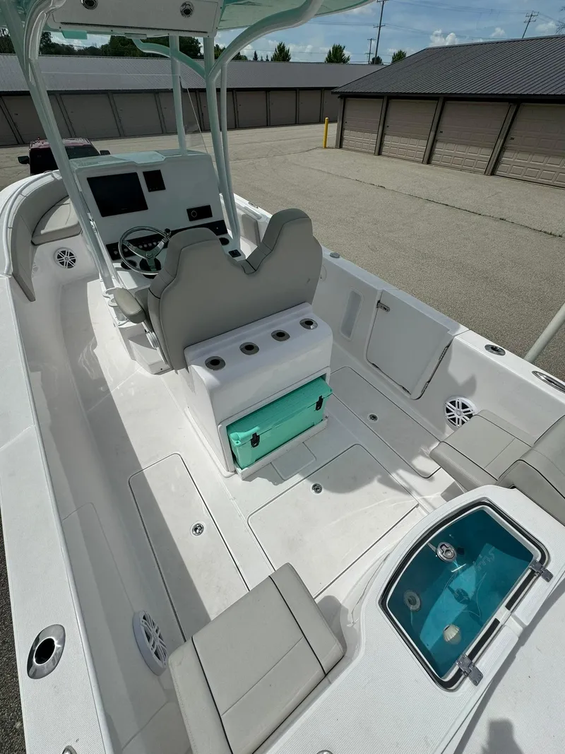 Slide: The Image of 2022 Streamline Center Console boat with modern seating and storage features. - 8