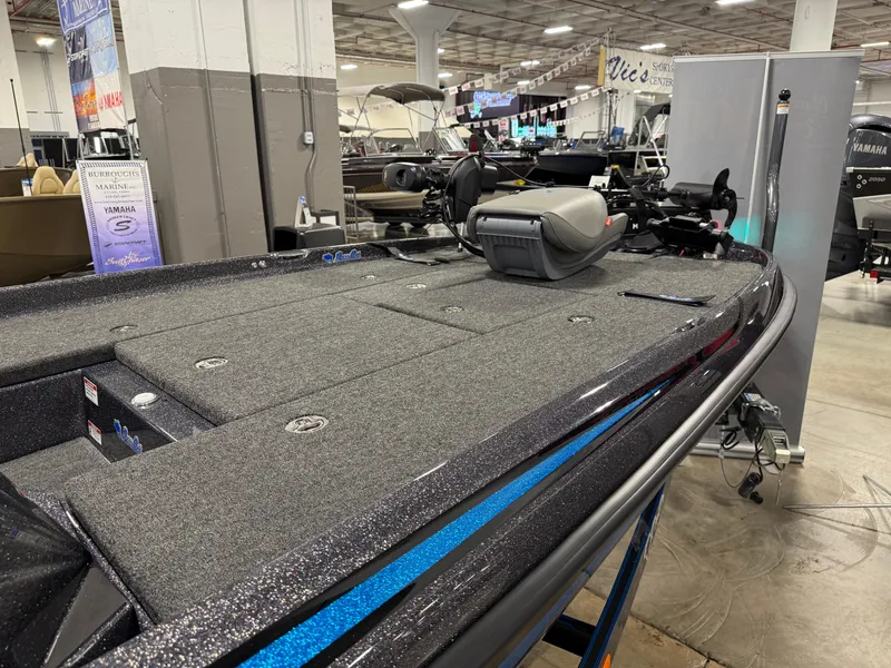 Slide: The Image of 2025 Bass Cat Cougar FTD boat on display in showroom. - 20