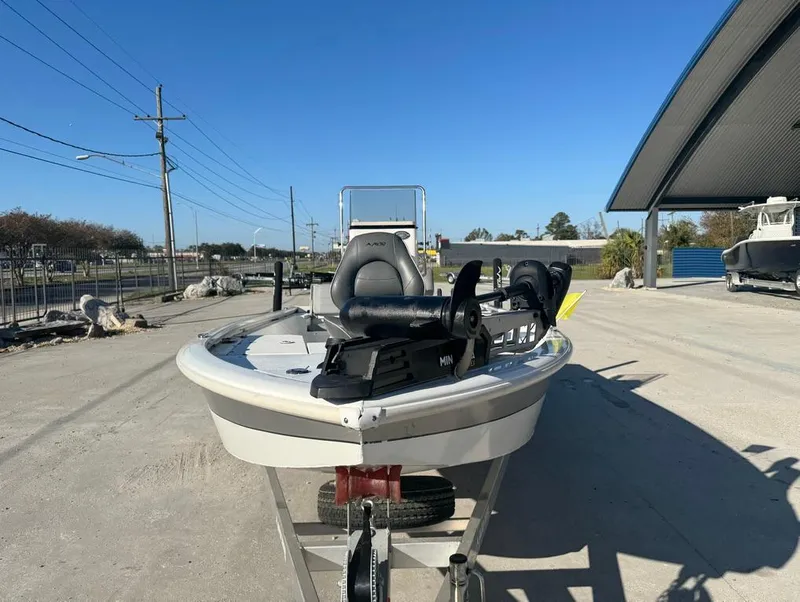 Slide: The Image of 2021 Avid 21 FS boat on trailer in outdoor setting. - 8