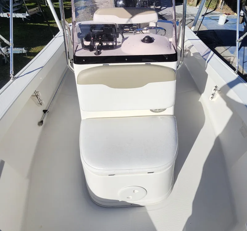 Slide: The Image of 2019 Mako 184 CC boat interior with console and seating. - 16
