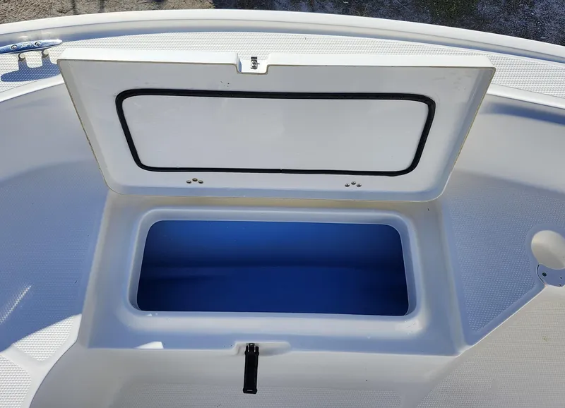Slide: The Image of Open storage compartment on 2019 Mako 184 CC boat. - 22