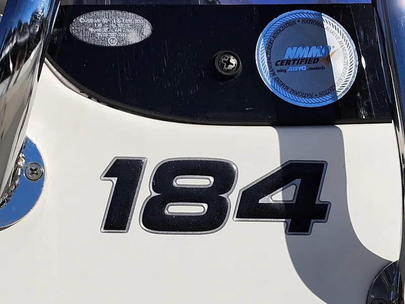 Slide: The Image of 2019 Mako 184 CC boat with NMMA certification sticker. - 30