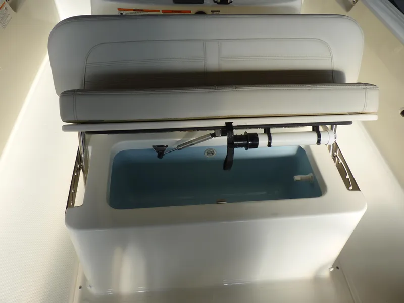 Slide: The Image of 2025 Boston Whaler 190 Montauk boat seat with storage compartment. - 15