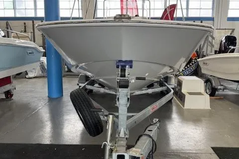 Slide: The Image of 2025 Boston Whaler 190 Montauk boat on trailer in showroom. - 4