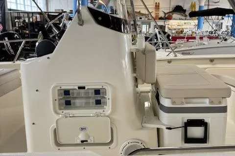 Slide: The Image of 2025 Boston Whaler 190 Montauk boat interior with seating and storage compartments. - 7