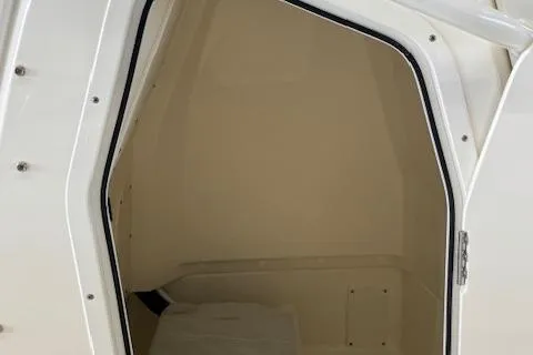 Slide: The Image of Interior cabin of 2025 Boston Whaler 220 Dauntless boat. - 6