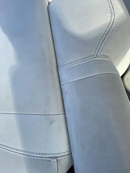 Slide: The Image of Close-up of 2017 Malibu 21 VLX boat seat upholstery in light gray. - 47