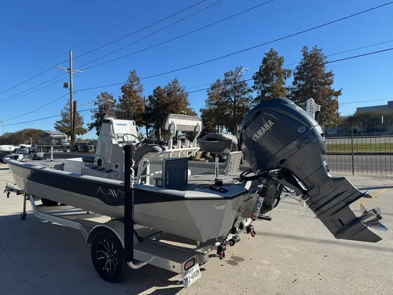 Slide: The Image of 2024 Avid 21 FS Platinum boat with Yamaha engine on trailer. - 12