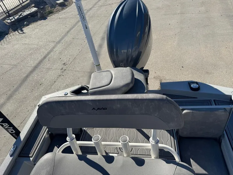 Slide: The Image of 2024 Avid 21 FS Platinum boat interior with seating and motor. - 15