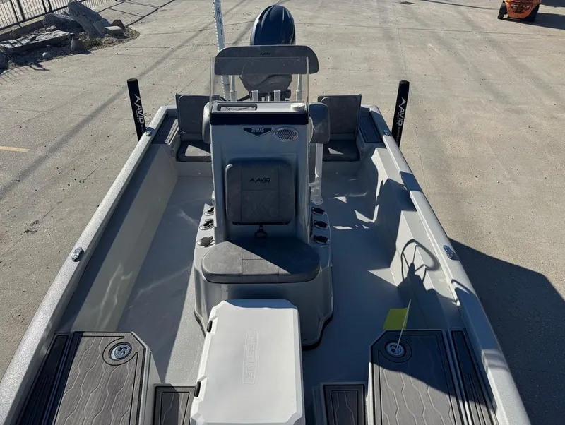 Slide: The Image of 2024 Avid 21 FS Platinum boat interior with seating and console. - 17
