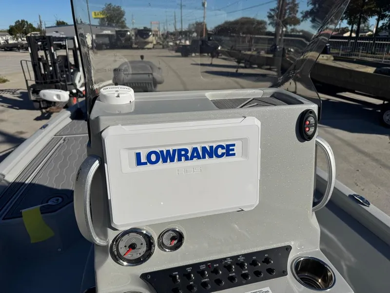 Slide: The Image of Avid 21 FS Platinum 2024 boat console with Lowrance electronics and gauges. - 6
