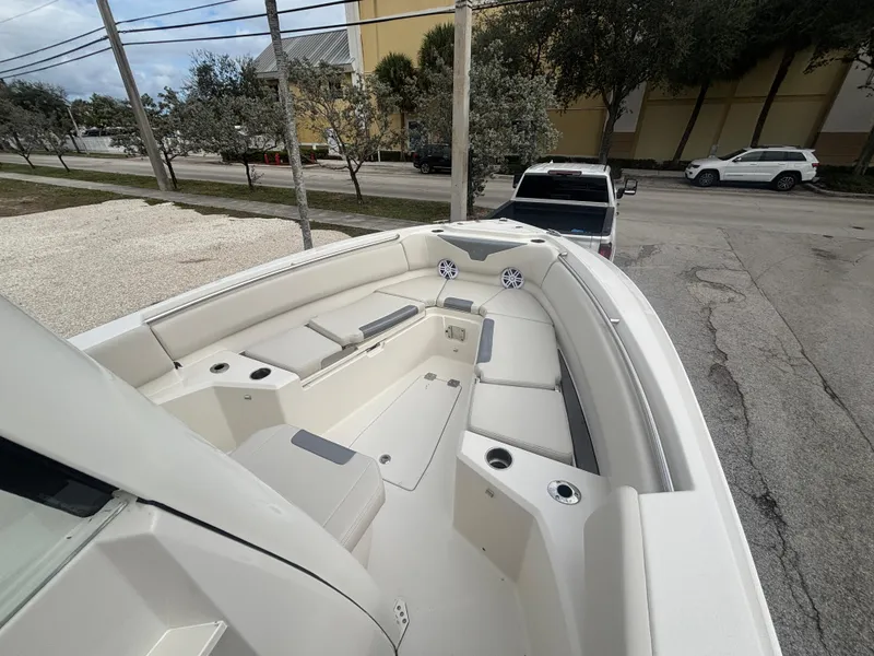 Slide: The Image of 2025 Sailfish 232 CC boat with spacious seating and modern design. - 15