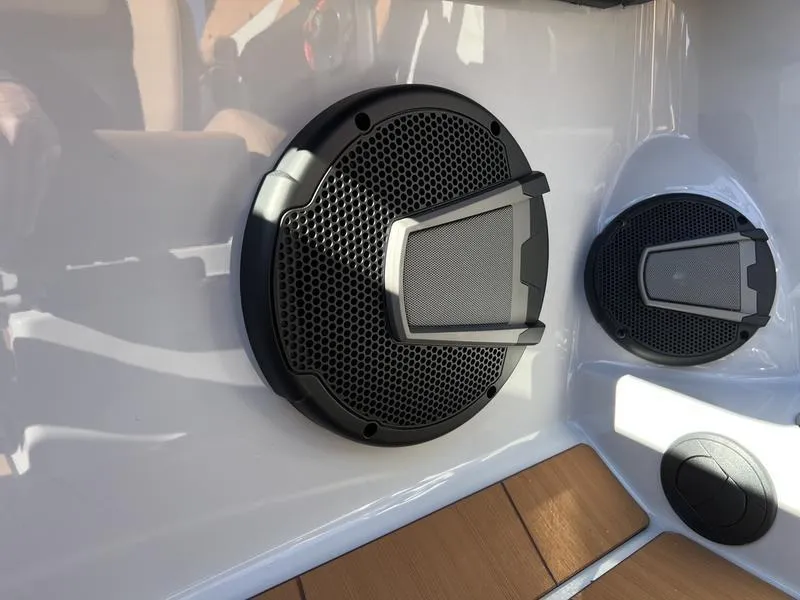 Slide: The Image of Close-up of Axis A245 2025 boat speakers on a sleek white surface. - 12