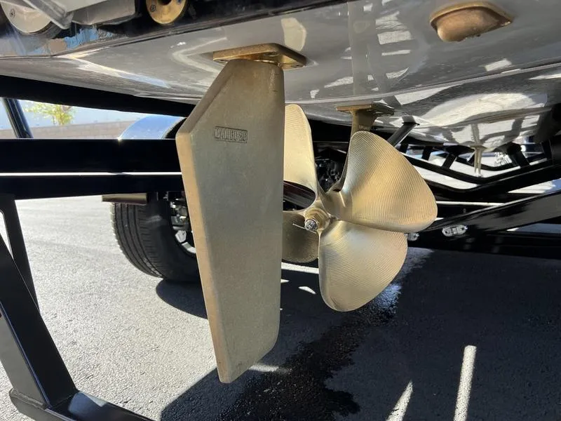 Slide: The Image of 2025 Axis A245 boat propeller and rudder on trailer. - 21