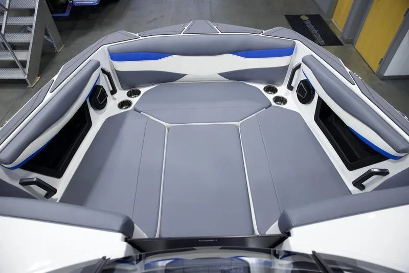 Slide: The Image of Luxurious interior of 2025 Axis A245 boat with gray and blue seating. - 15