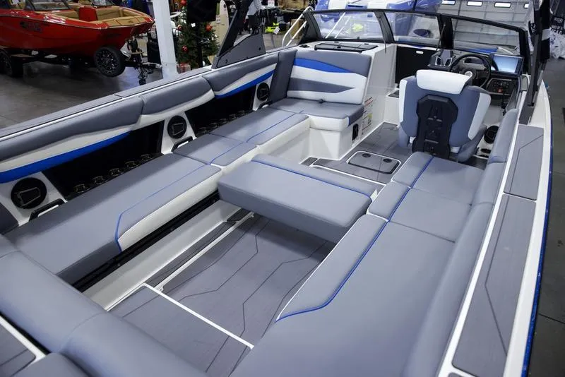 Slide: The Image of 2025 Axis A245 boat interior with spacious seating and modern design. - 17