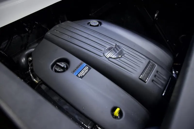 Slide: The Image of 2025 Axis A245 engine compartment with sleek black cover design. - 3