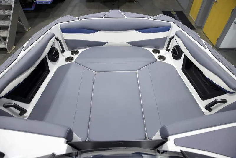 Slide: The Image of 2025 Axis A245 boat interior with gray and white seating, modern design. - 15